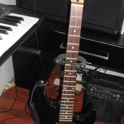 Electric guitar with Rok Axe Amplifier