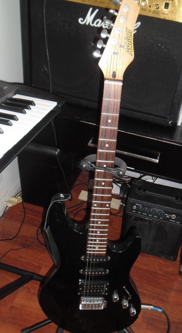 Electric guitar with Rok Axe Amplifier